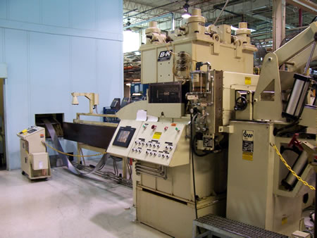 A B&K 60-1.156 Precision Corrective Leveler integrated into a new CWP Press Feed Line